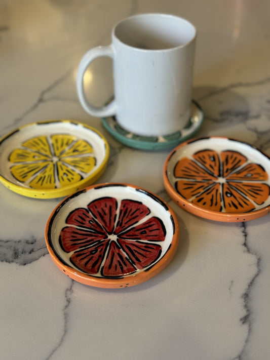 Pottery - Set of four fruit coasters